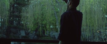 Movie still from “Kye Kye - Honest Affection” (2013), directed by Salomon Ligthelm – Medium shot, Over the shoulder angle