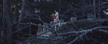 Movie still from “Kye Kye - Honest Affection” (2013), directed by Salomon Ligthelm – Wide shot, Low angle