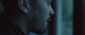 Movie still from “Kye Kye - Honest Affection” (2013), directed by Salomon Ligthelm – Extreme Close Up shot, Over the shoulder angle