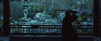 Movie still from “Kye Kye - Honest Affection” (2013), directed by Salomon Ligthelm – Medium shot, Over the shoulder angle