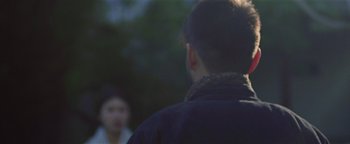 Movie still from “Kye Kye - Honest Affection” (2013), directed by Salomon Ligthelm – Extreme Close Up shot, Over the shoulder angle