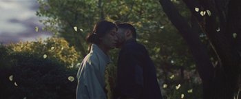 Movie still from “Kye Kye - Honest Affection” (2013), directed by Salomon Ligthelm – Extreme Close Up shot, Over the shoulder angle