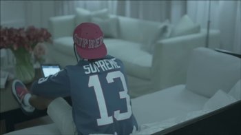 Movie still from “A$AP Rocky - Fashion Killa” (2013), directed by Virgil Abloh – Medium shot, High angle