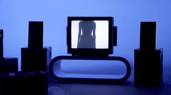 Movie still from “Hook N Sling & Chris Willis - Magnet” (2013), directed by Ryan Staake – Wide shot, Low angle