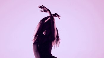 Movie still from “Hook N Sling & Chris Willis - Magnet” (2013), directed by Ryan Staake – Medium shot, Low angle