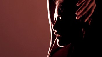 Movie still from “Hook N Sling & Chris Willis - Magnet” (2013), directed by Ryan Staake – Extreme Close Up shot, Low angle