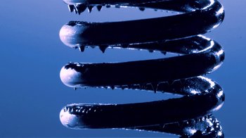 Movie still from “Hook N Sling & Chris Willis - Magnet” (2013), directed by Ryan Staake – Extreme Close Up shot, Overhead angle