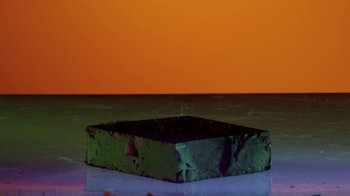 Movie still from “Hook N Sling & Chris Willis - Magnet” (2013), directed by Ryan Staake – Extreme Close Up shot, Overhead angle