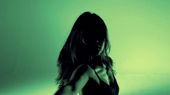 Movie still from “Hook N Sling & Chris Willis - Magnet” (2013), directed by Ryan Staake – Extreme Close Up shot, Low angle