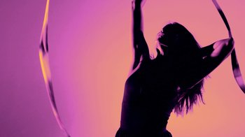 Movie still from “Hook N Sling & Chris Willis - Magnet” (2013), directed by Ryan Staake – Medium shot, Low angle