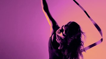 Movie still from “Hook N Sling & Chris Willis - Magnet” (2013), directed by Ryan Staake – Medium shot, Low angle