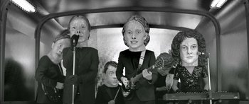 Movie still from “Arcade Fire - Reflektor” (2013), directed by Anton Corbijn – Close Up shot, Low angle