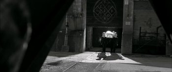 Movie still from “Arcade Fire - Reflektor” (2013), directed by Anton Corbijn – Wide shot, Low angle