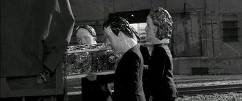 Movie still from “Arcade Fire - Reflektor” (2013), directed by Anton Corbijn – Medium shot, Low angle