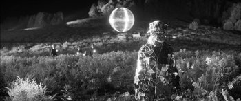 Movie still from “Arcade Fire - Reflektor” (2013), directed by Anton Corbijn – Wide shot, Low angle