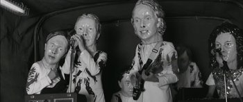 Movie still from “Arcade Fire - Reflektor” (2013), directed by Anton Corbijn – Close Up shot, Low angle