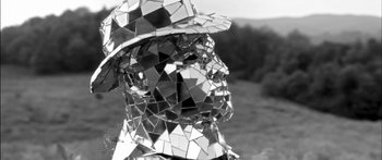 Movie still from “Arcade Fire - Reflektor” (2013), directed by Anton Corbijn – Extreme Close Up shot, Low angle