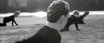 Movie still from “Arcade Fire - Reflektor” (2013), directed by Anton Corbijn – Close Up shot, High angle