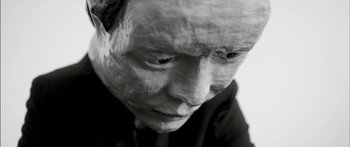 Movie still from “Arcade Fire - Reflektor” (2013), directed by Anton Corbijn – Extreme Close Up shot, Low angle