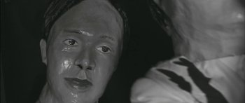 Movie still from “Arcade Fire - Reflektor” (2013), directed by Anton Corbijn – Extreme Close Up shot, Low angle