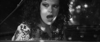 Movie still from “Arcade Fire - Reflektor” (2013), directed by Anton Corbijn – Close Up shot, Low angle