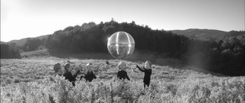 Movie still from “Arcade Fire - Reflektor” (2013), directed by Anton Corbijn – Wide shot, Low angle