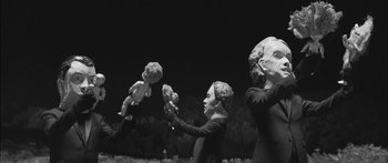 Movie still from “Arcade Fire - Reflektor” (2013), directed by Anton Corbijn – Medium shot, Low angle