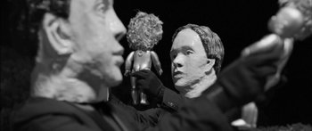 Movie still from “Arcade Fire - Reflektor” (2013), directed by Anton Corbijn – Extreme Close Up shot, Over the shoulder angle