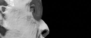 Movie still from “Arcade Fire - Reflektor” (2013), directed by Anton Corbijn – Extreme Close Up shot, Low angle