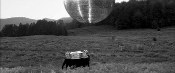 Movie still from “Arcade Fire - Reflektor” (2013), directed by Anton Corbijn – Wide shot, Low angle