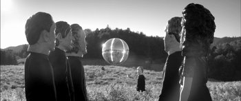 Movie still from “Arcade Fire - Reflektor” (2013), directed by Anton Corbijn – Wide shot, Low angle