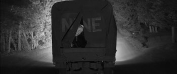 Movie still from “Arcade Fire - Reflektor” (2013), directed by Anton Corbijn – Medium shot, High angle