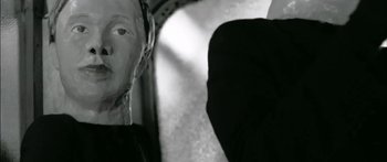 Movie still from “Arcade Fire - Reflektor” (2013), directed by Anton Corbijn – Extreme Close Up shot, Low angle