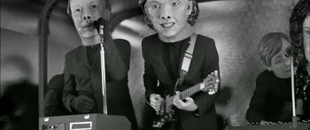 Movie still from “Arcade Fire - Reflektor” (2013), directed by Anton Corbijn – Close Up shot, Low angle