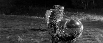 Movie still from “Arcade Fire - Reflektor” (2013), directed by Anton Corbijn – Extreme Close Up shot, Low angle