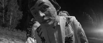 Movie still from “Arcade Fire - Reflektor” (2013), directed by Anton Corbijn – Extreme Close Up shot, Low angle