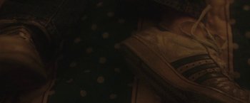 Movie still from “Dawn Golden - All I Want” (2013), directed by Tyler T. Williams – Extreme Close Up shot, Overhead angle