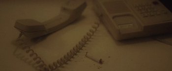 Movie still from “Dawn Golden - All I Want” (2013), directed by Tyler T. Williams – Extreme Close Up shot, Overhead angle