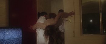 Movie still from “Dawn Golden - All I Want” (2013), directed by Tyler T. Williams – Medium shot, Low angle
