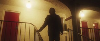Movie still from “Dawn Golden - All I Want” (2013), directed by Tyler T. Williams – Medium shot, Low angle