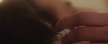 Movie still from “Dawn Golden - All I Want” (2013), directed by Tyler T. Williams – Extreme Close Up shot, High angle