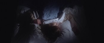 Movie still from “Dawn Golden - All I Want” (2013), directed by Tyler T. Williams – Medium shot, Overhead angle