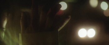 Movie still from “Dawn Golden - All I Want” (2013), directed by Tyler T. Williams – Extreme Close Up shot, Overhead angle