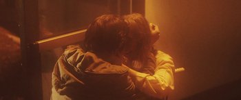 Movie still from “Dawn Golden - All I Want” (2013), directed by Tyler T. Williams – Medium shot, High angle