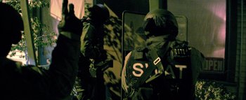 Movie still from “David Heartbreak - Acid Youths” (2013), directed by Ryan Staake – Medium shot, Low angle