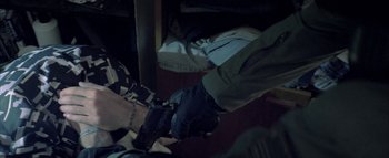 Movie still from “David Heartbreak - Acid Youths” (2013), directed by Ryan Staake – Medium shot, Overhead angle