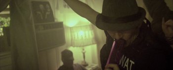 Movie still from “David Heartbreak - Acid Youths” (2013), directed by Ryan Staake – Medium shot, Low angle