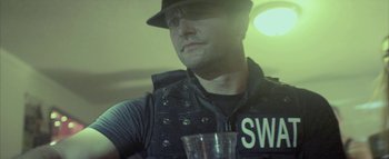 Movie still from “David Heartbreak - Acid Youths” (2013), directed by Ryan Staake – Close Up shot, Low angle