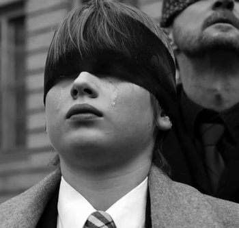 Movie still from “Indochine - College Boy” (2013), directed by Xavier Dolan – Extreme Close Up shot, Over the shoulder angle