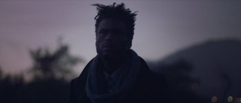 Movie still from “Bonobo - First Fires” (2013), directed by Young Replicant – Close Up shot, Low angle